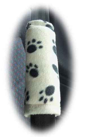 1 pair of fleece paw print car seatbelt pads white and black and multicolour