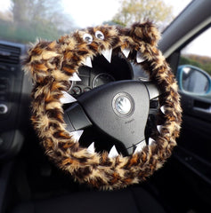 Handmade fuzzy leopard print monster car steering wheel cover with googly eyes and felt teeth