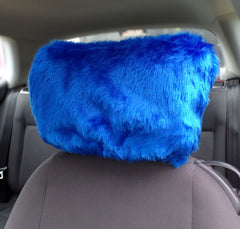 Royal Blue fluffy faux fur car headrest cover on a car seat