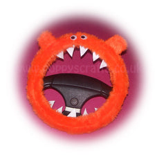 Fuzzy faux fur Tangerine Orange Monster steering wheel cover with googly eyes, ears, and teeth. fluffy furry car fun Poppys Crafts